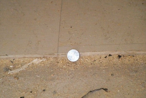 瓷砖铺完正常比没铺前高多少公分,瓷砖铺完了比客厅矮了五公分