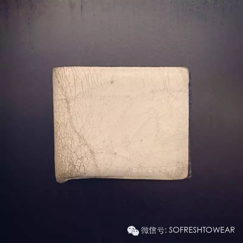 买钱包买拉链的还是不拉链的,买钱包