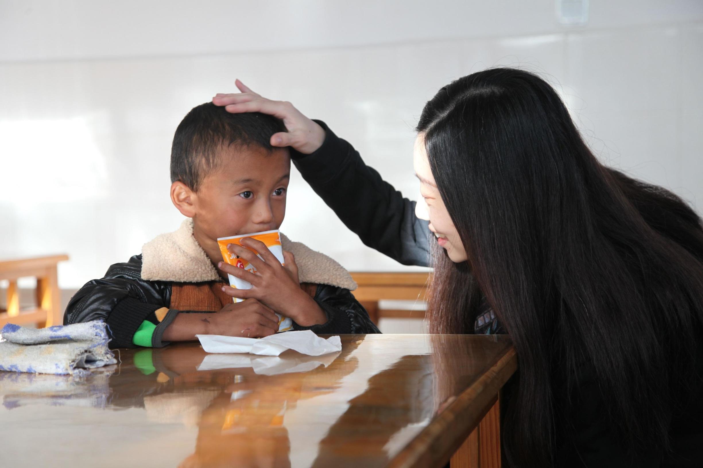 FXBTG大旗金融携手第一财经“一份早餐”温暖云南山区