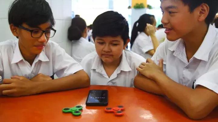 你情我愿下，小学生可用金钱交易“指尖陀螺”吗？