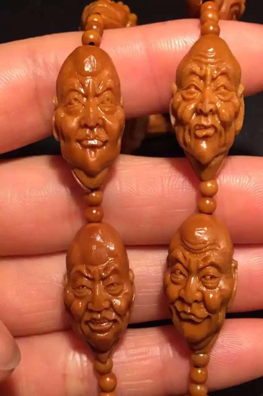 文玩橄榄核雕刻手串出售,橄榄核雕刻的文玩怎么盘好看
