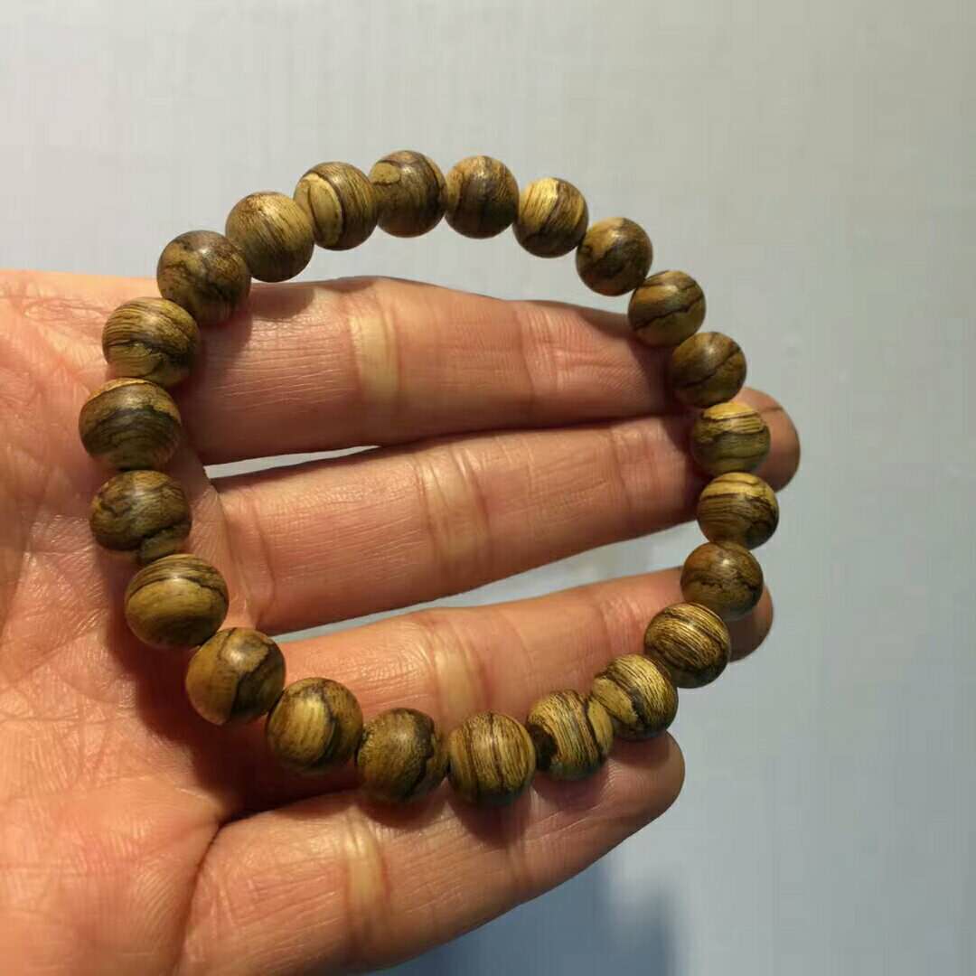 加里曼丹沉香手串有什么寓意,加里曼丹沉香108颗手串怎么搭配
