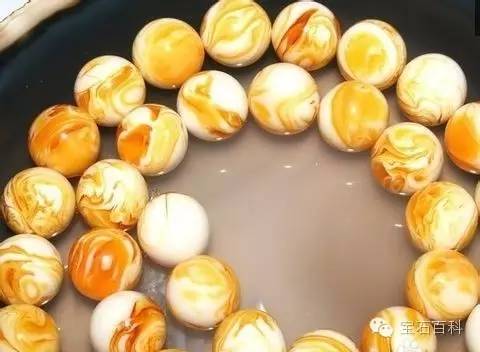 烤色蜜蜡和非烤色蜜蜡对比图,蜜蜡烤色算二代蜜蜡吗