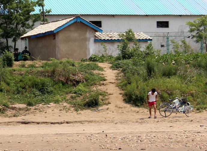 中朝边境美丽的风景,中朝边境桃花盛开的地方