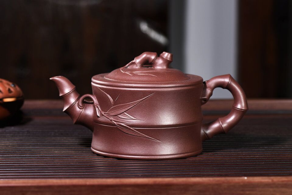 紫砂壶出水不畅怎么解决,紫砂壶压住盖子会出水不
