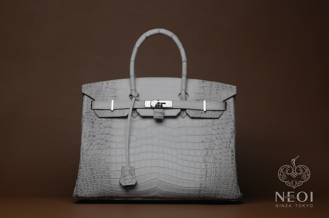 怎样鉴别是不是真正的鳄鱼皮包,鳄鱼皮包包怎么选