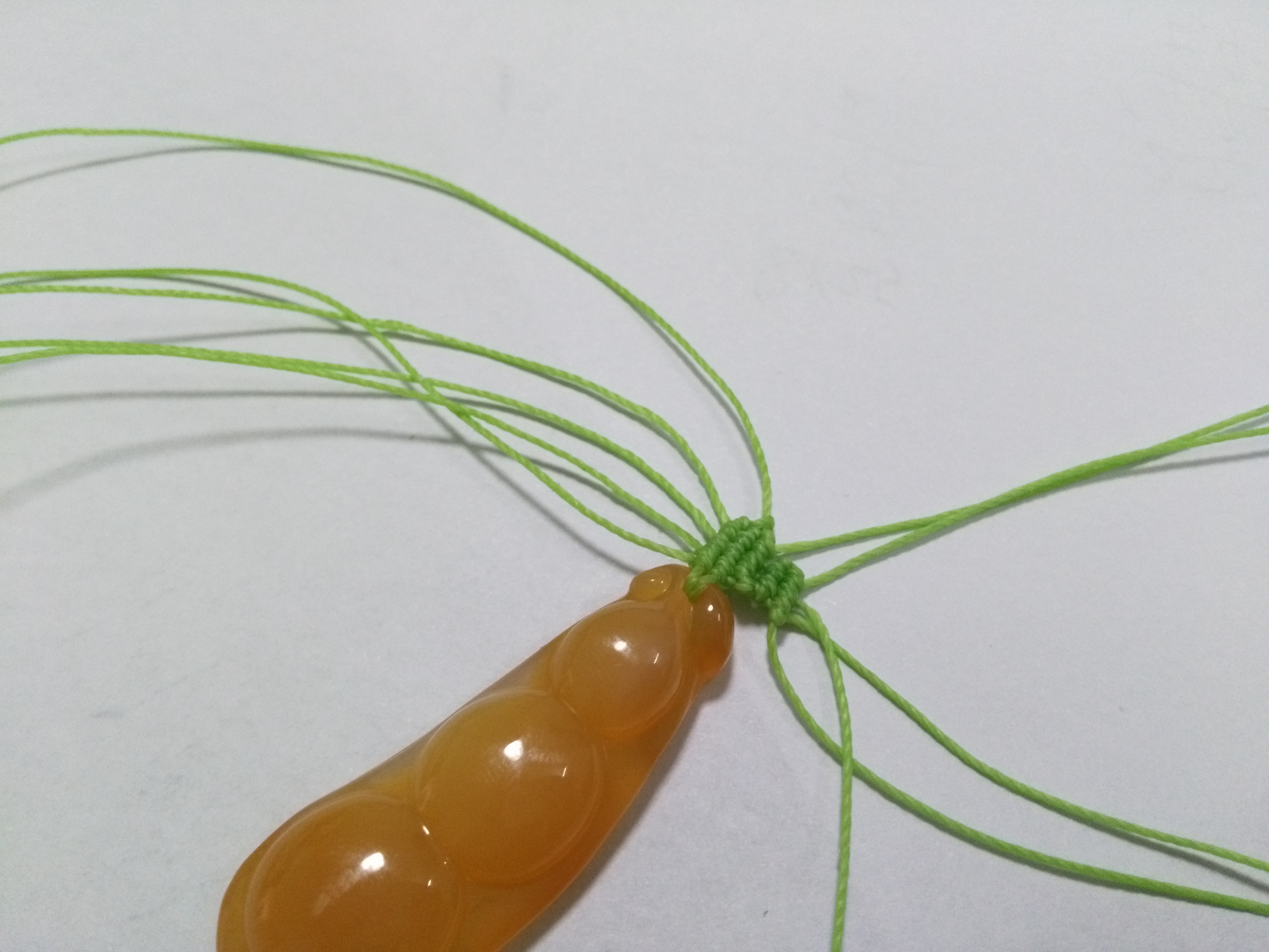 玛瑙豆子编手机吊坠法教程,玉豌豆吊坠怎么编绳