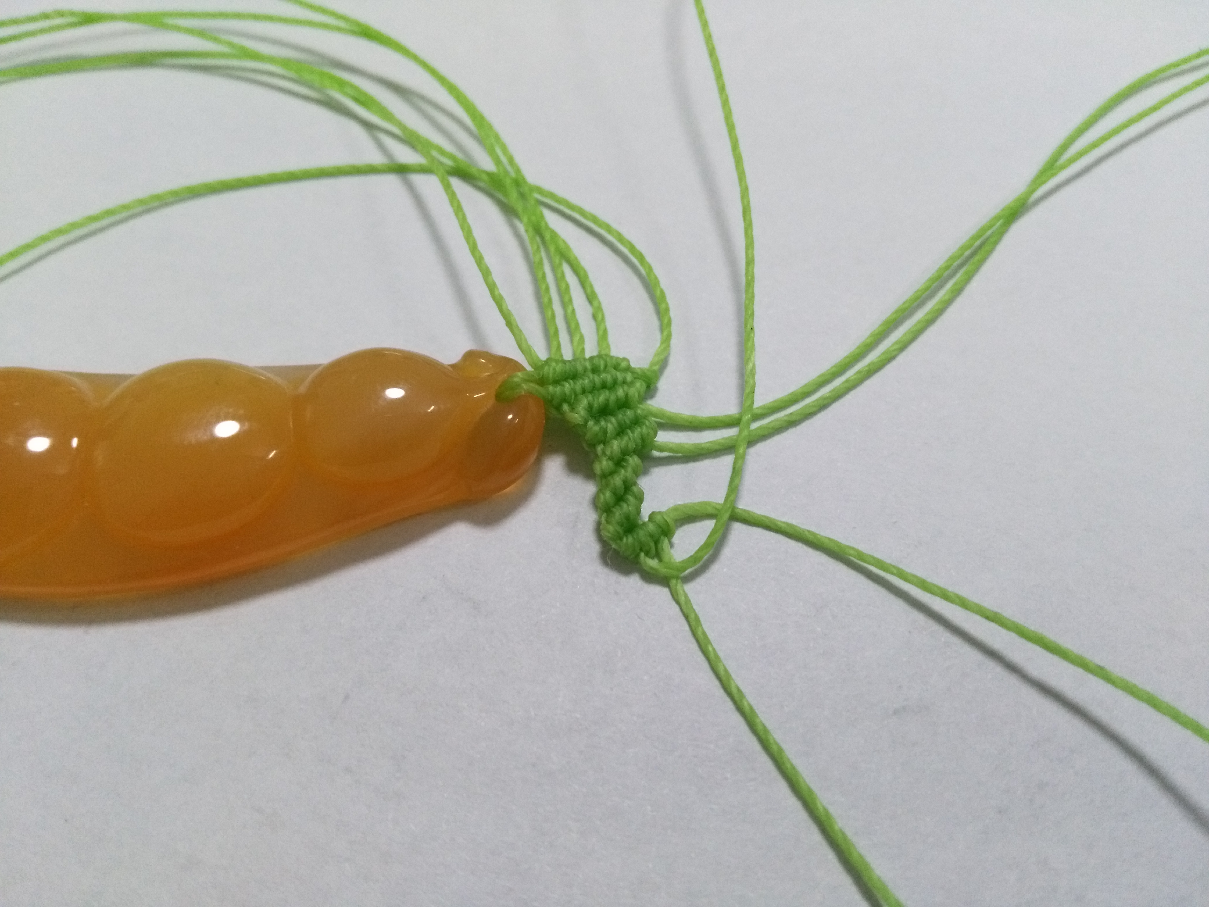 玛瑙豆子编手机吊坠法教程,玉豌豆吊坠怎么编绳