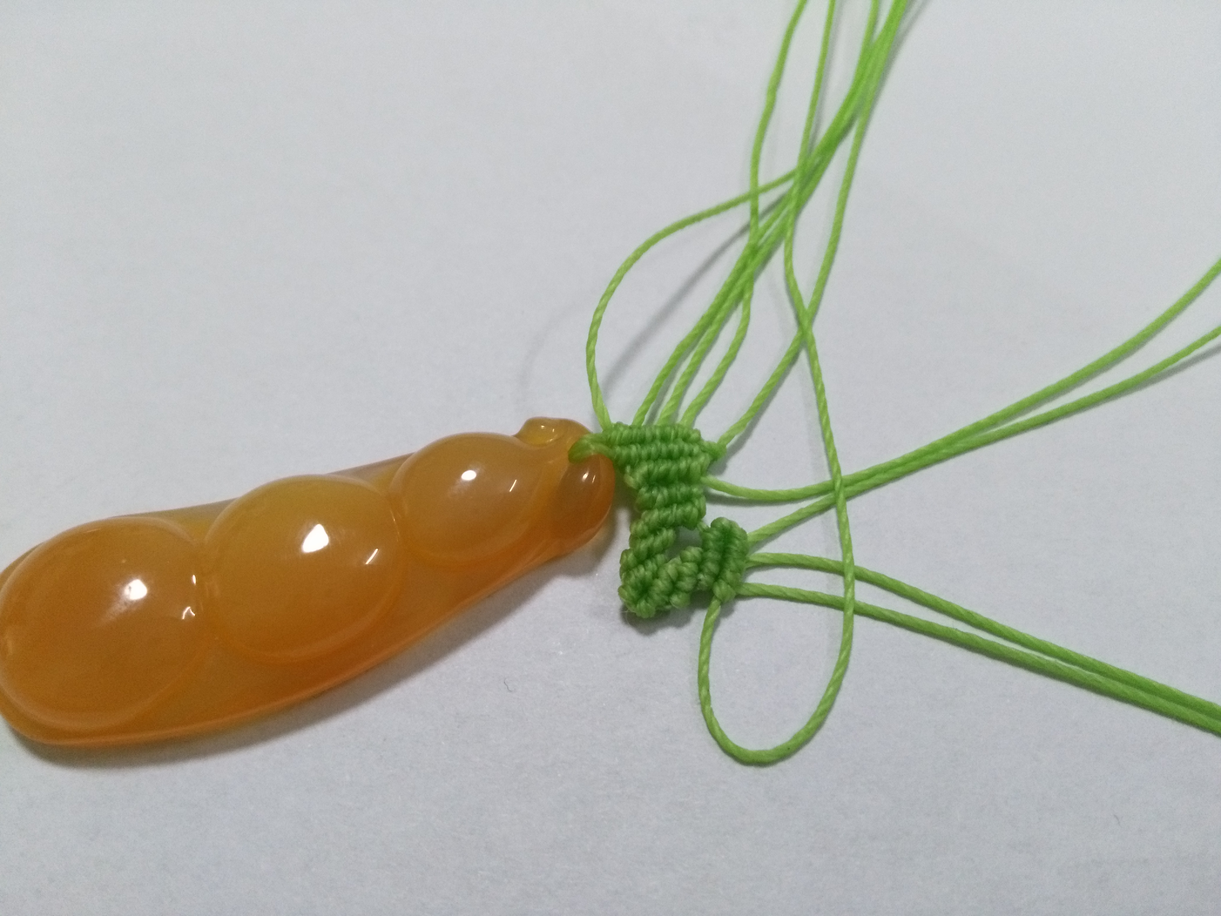 玛瑙豆子编手机吊坠法教程,玉豌豆吊坠怎么编绳