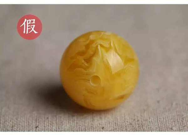 二代蜜蜡的鉴别特征,二代蜜蜡最简单的鉴别方法