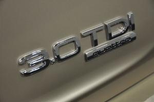 车屁股后面的字母都代表什么意思,汽车屁股上的字母代表什么