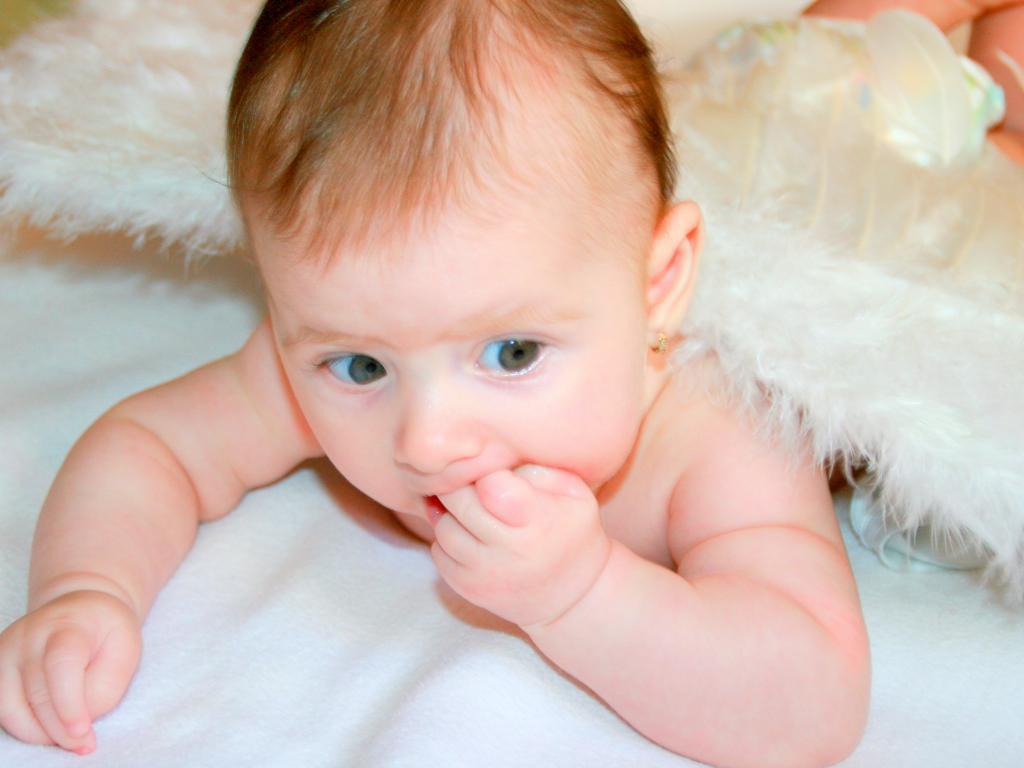 孩子身上的痣能不能点掉,孩子身上的痣