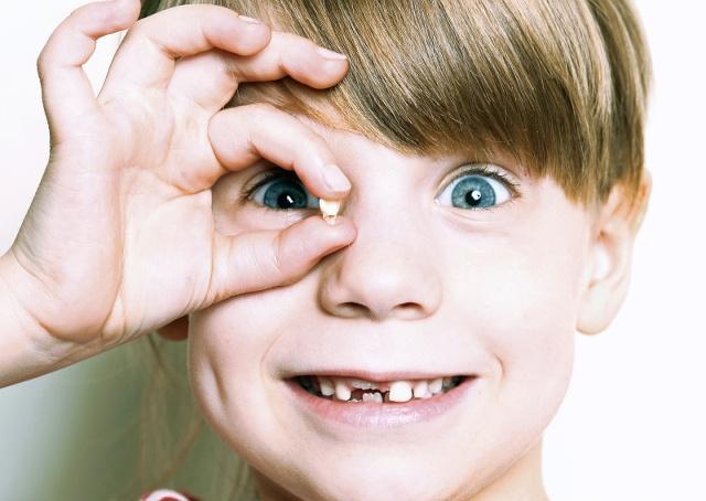 周公解梦梦见牙掉是什么意思,梦见牙一块一块的掉是什么预兆