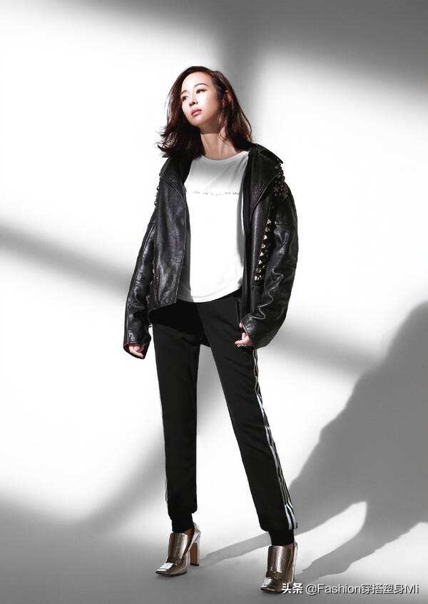 张钧甯皮衣机场照 (张钧甯身穿黑色皮衣)