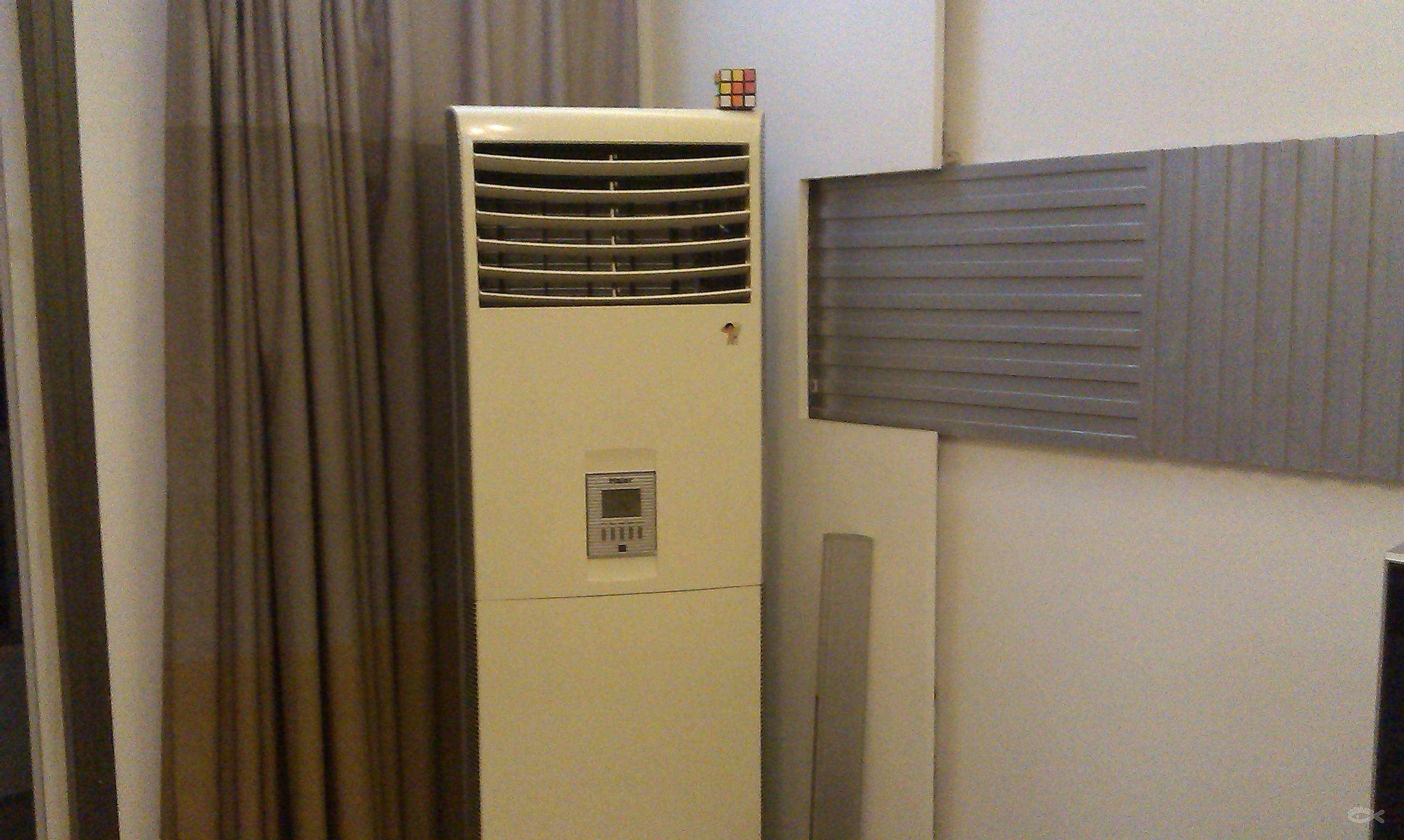 圆柱式和柜式空调哪种效果好,柜式空调是圆柱好还是方柜好