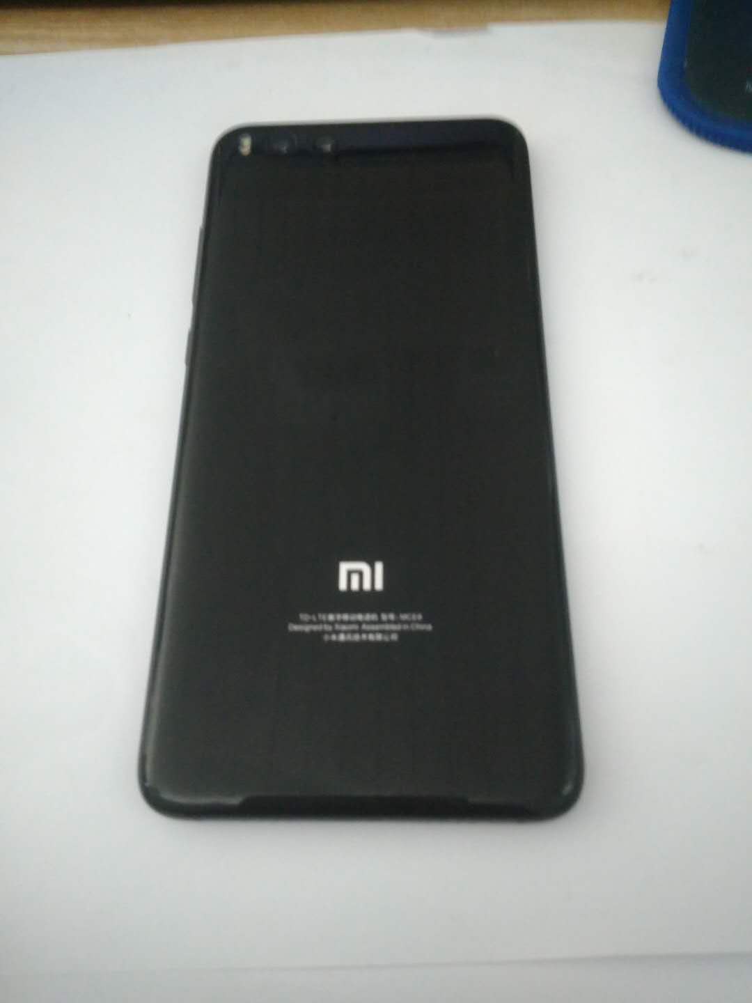 小米note3换完电池后自动重启,小米note3换电池教程品胜