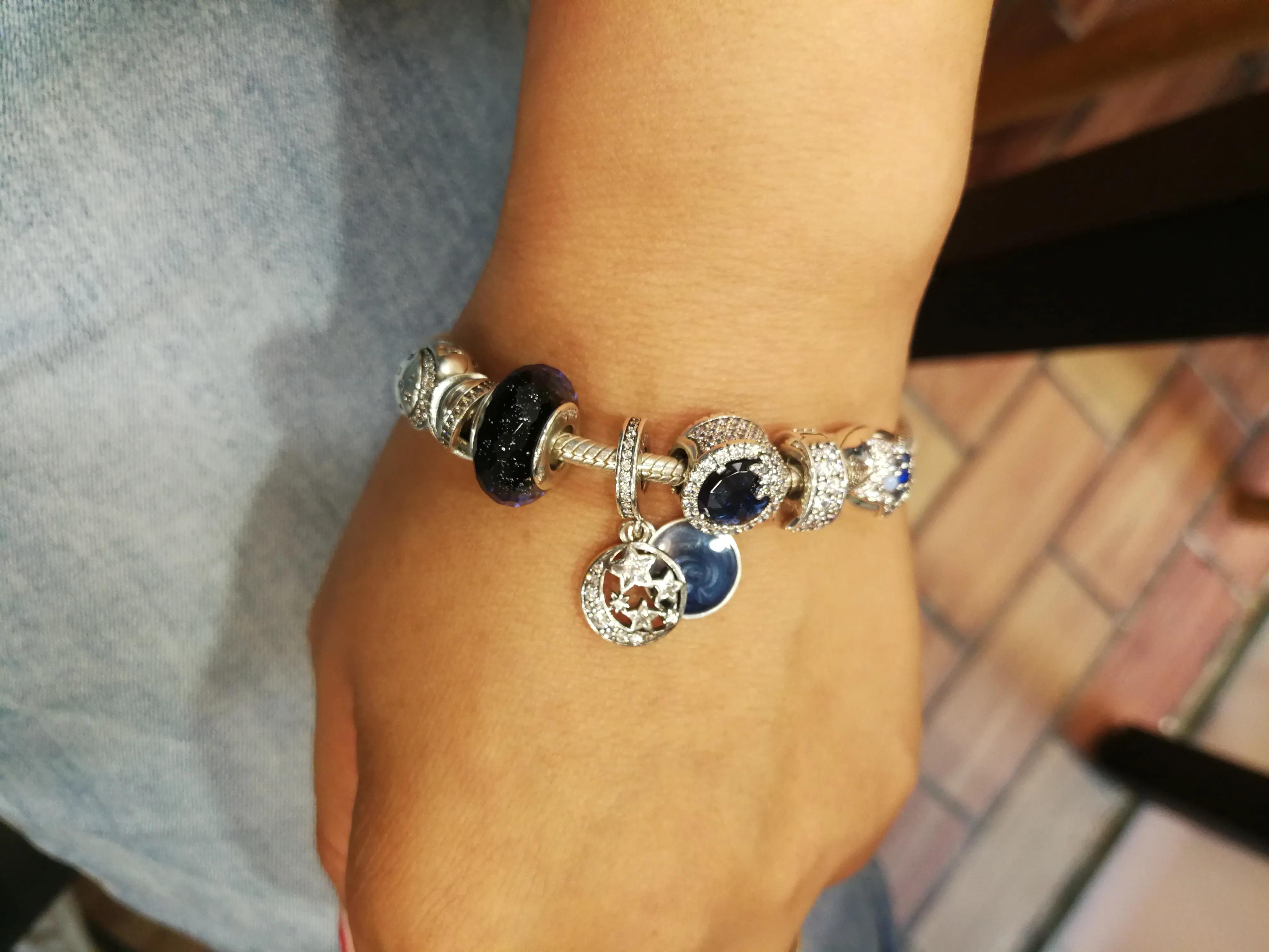 潘多拉几天就掉色变黑,潘多拉扣子变黑