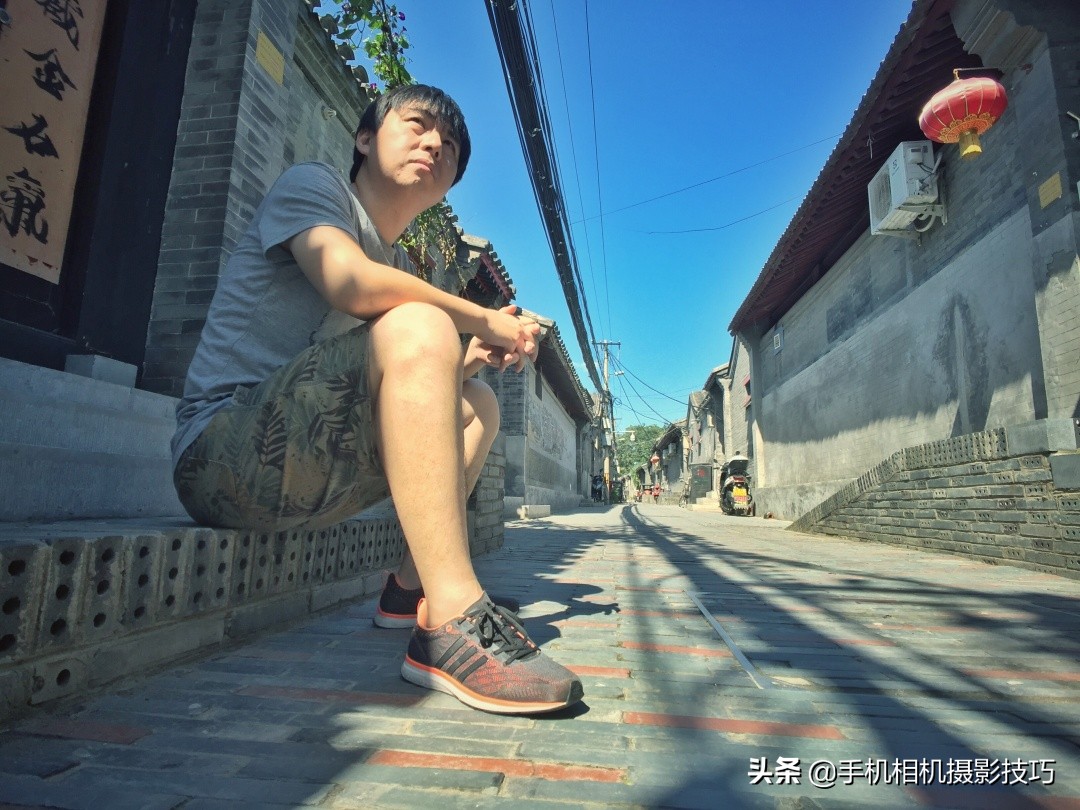 手机上面的长焦镜头是定焦吗,手机外挂长焦镜头真的有效果吗