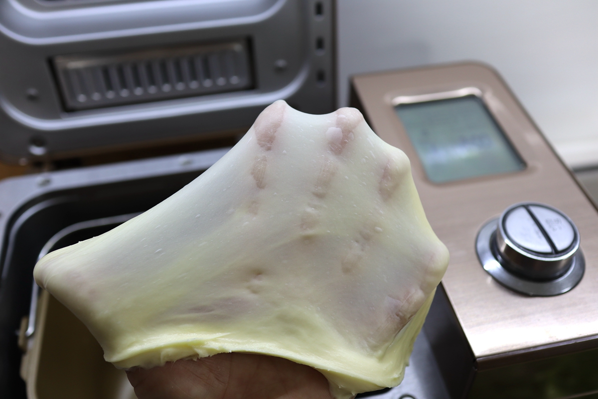 做面包快速出膜的方法,做面包的面团怎么才能揉出膜