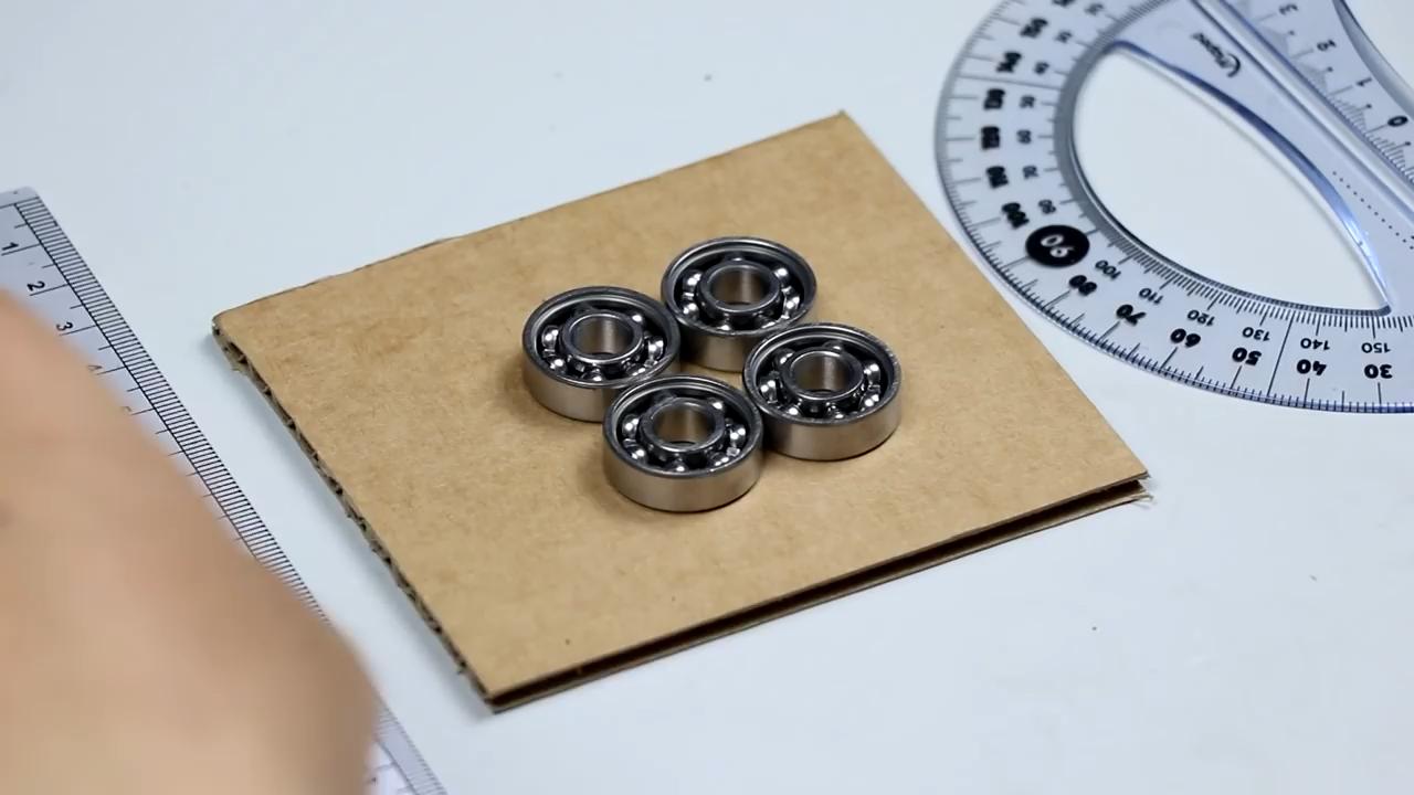 风火轮陀螺手工,如何制作指尖陀螺永动机