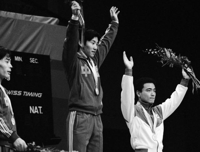 占旭刚2008举重冠军,占旭刚2000年举重央视解说