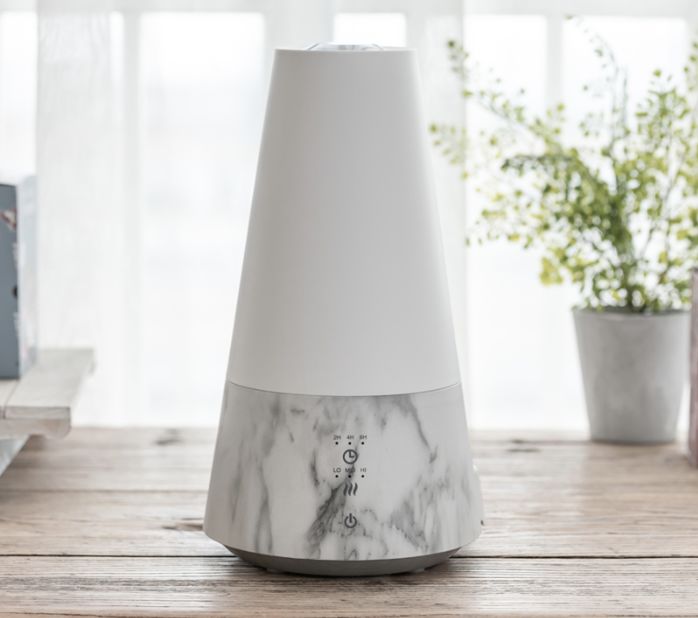 像艺术品的香薰加湿器,智能调节温度和雾量