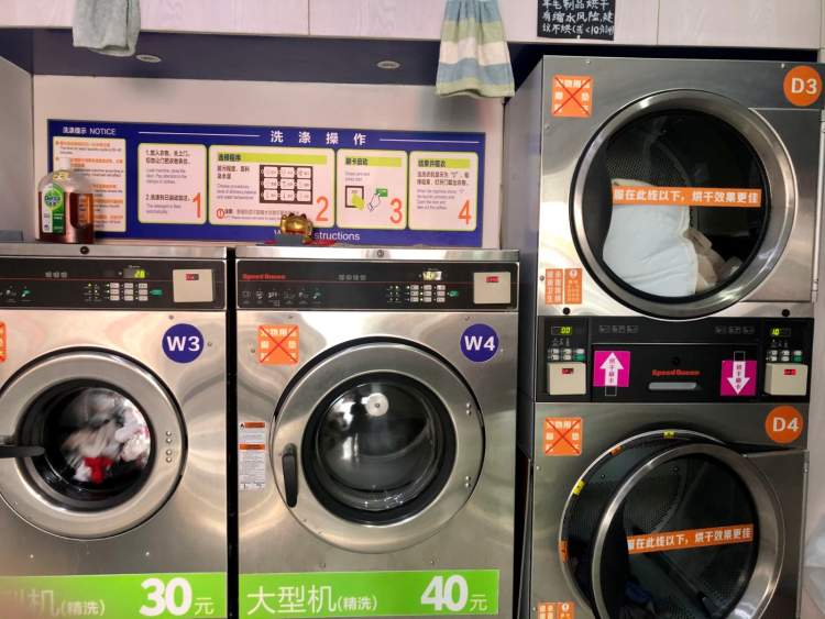 一元一分钟享受“五星级”自助烘洗服务，钦州北路上这家洗衣房惹人爱
