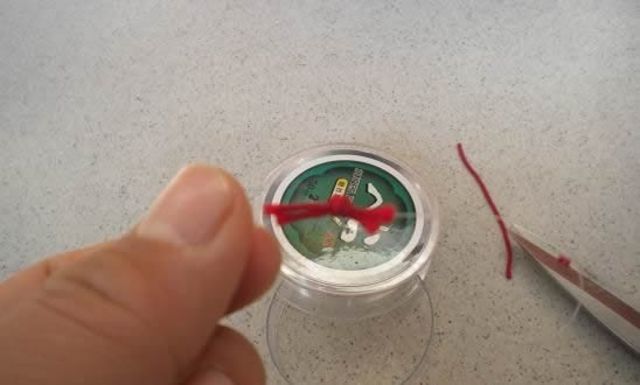 怎么把主线的断线绑在鱼竿上,主线断线打结方法