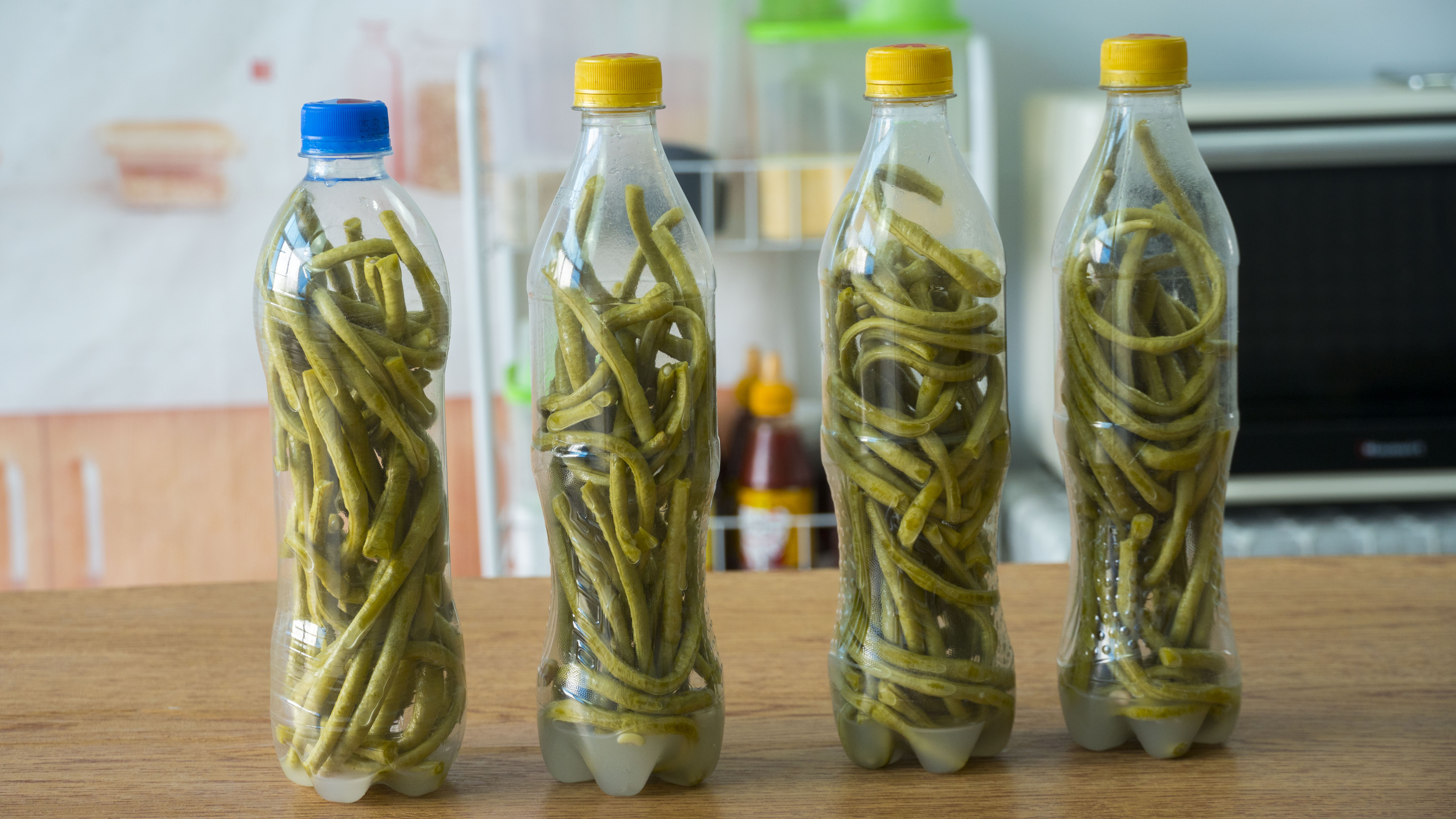 水瓶做酸豆角的方法,矿泉水瓶腌豆角的家常做法