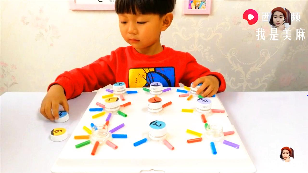 幼儿益智手工玩具制作塑料瓶,废物儿童益智玩具制作