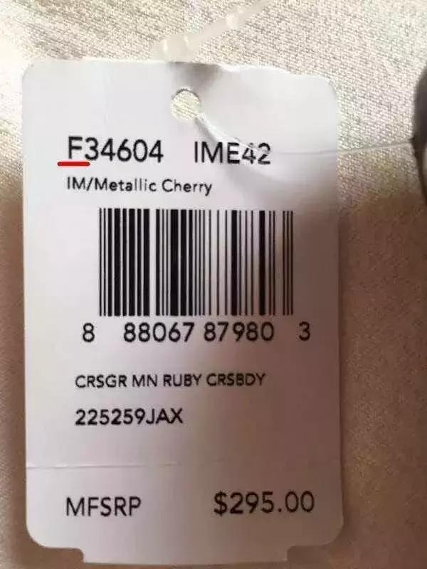 coach的专柜款大红斜挎女包,coach折扣店包跟专柜的区别