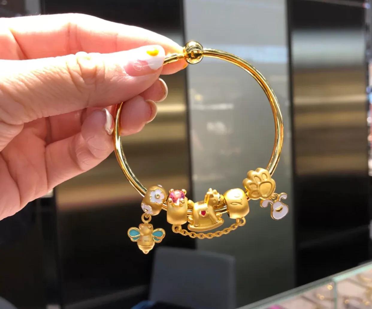 传统黄金手镯选周大福还是周生生,周生生黄金哪个款式最值得买