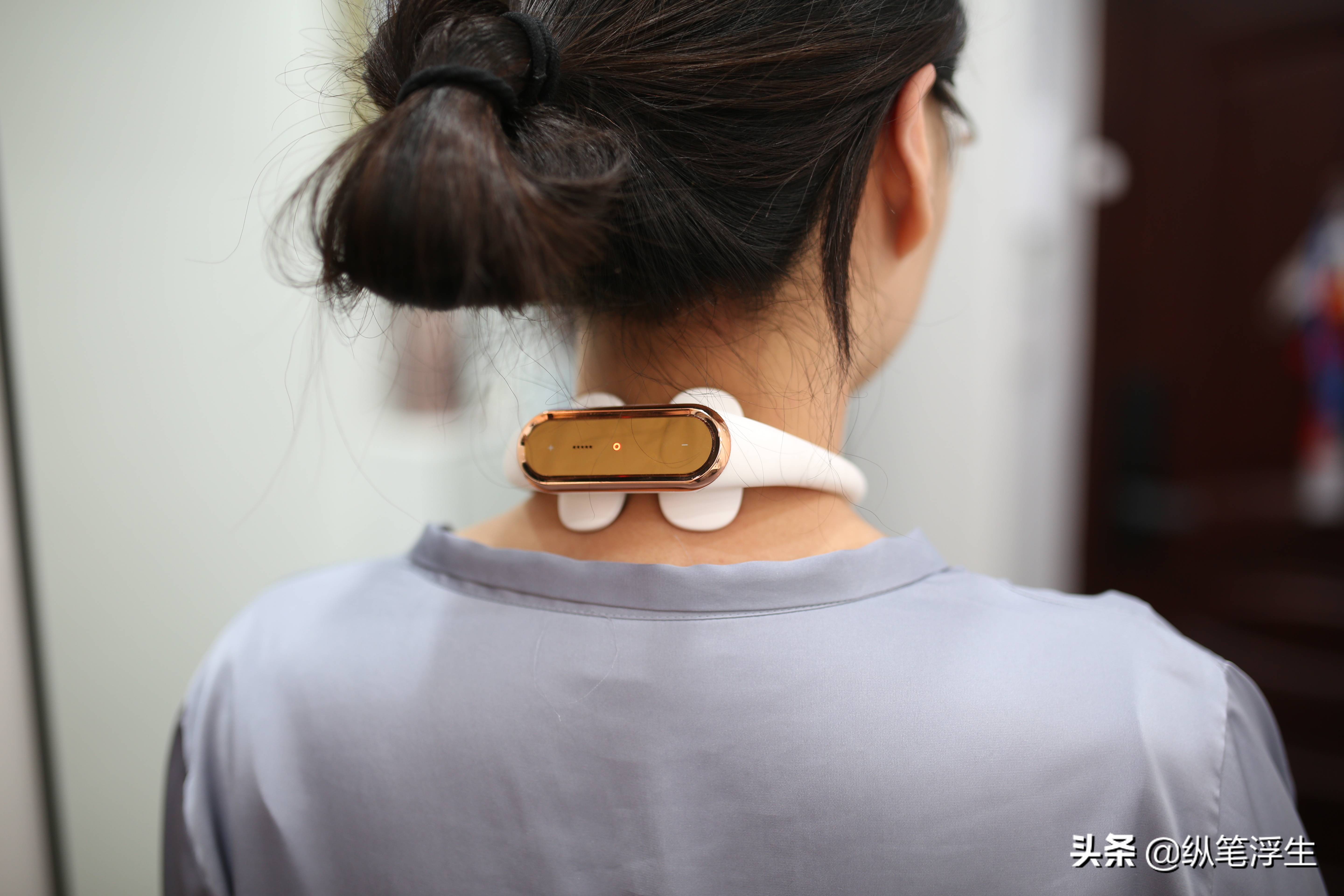 电脉冲、热敷按摩*管双**齐下：人与物AM2011颈椎按摩器测评