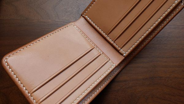 怎样辨别真皮包包的真假,大牌包包和普通真皮包该怎么选