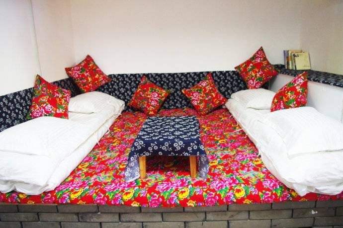 东北人为什么喜欢睡“火炕”，这种习俗源于何时？有何历史渊源？