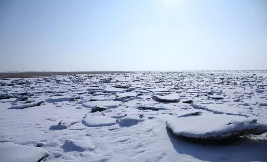 下雪后的海边图片大全,六月份的红海滩