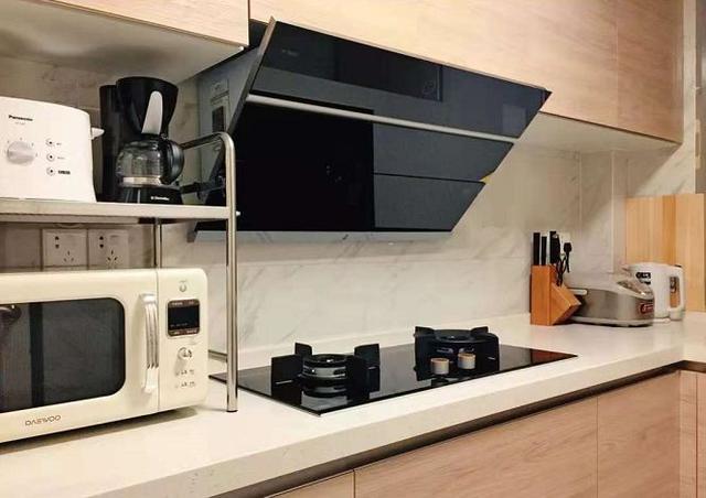 橱柜台面人造石好还是不锈钢好,橱柜用人造大理石台面还是石英石