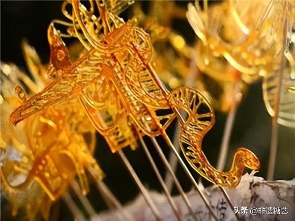 民间手工艺糖人糖画,糖画属于民间手工艺吗