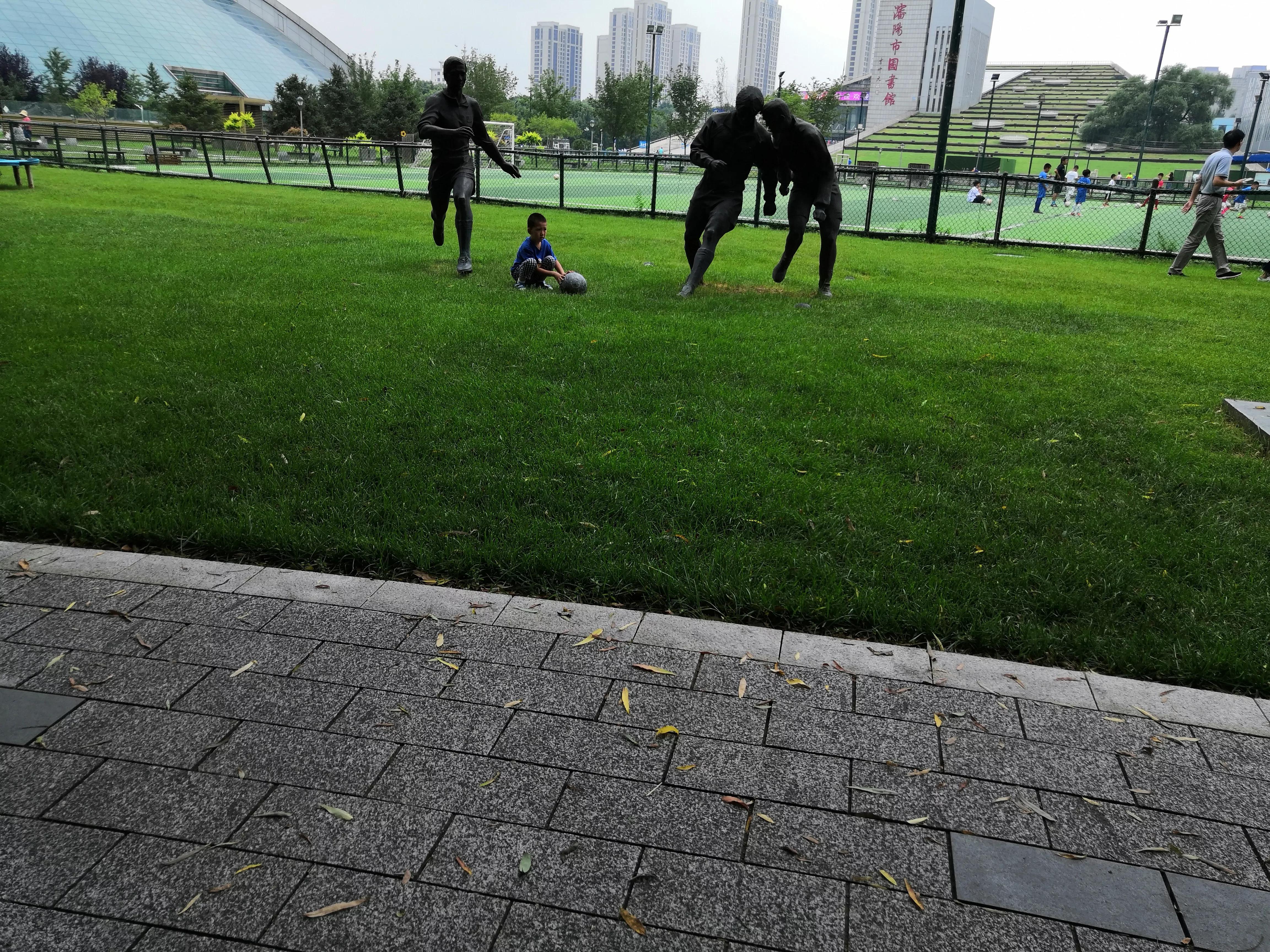 足球团队雕像,足球运动员的画像