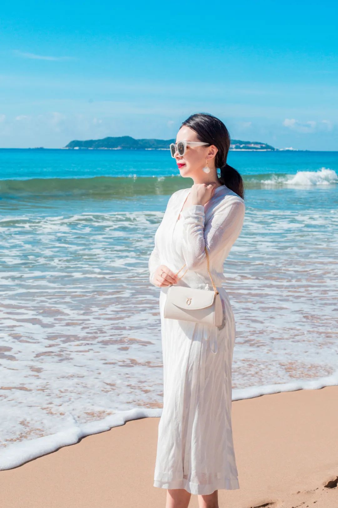 英国女王背爱马仕,英国女王背的香奈儿包包