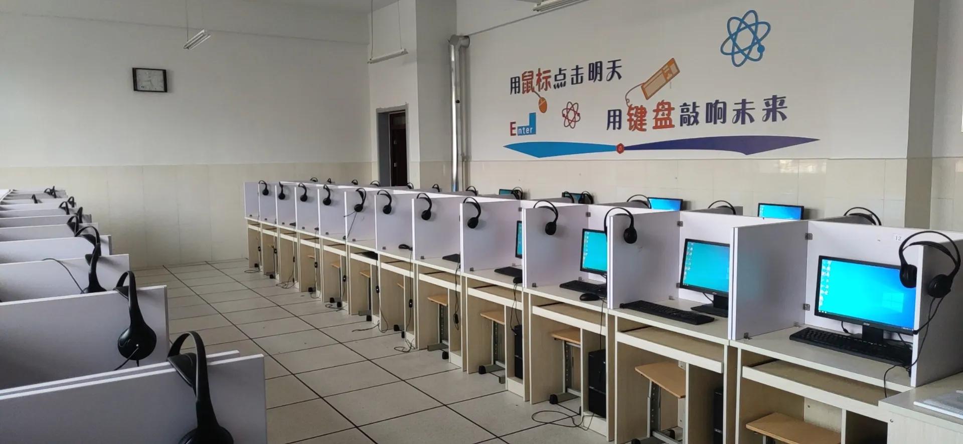 重做微机室电脑系统，迎接英语人机对话考试