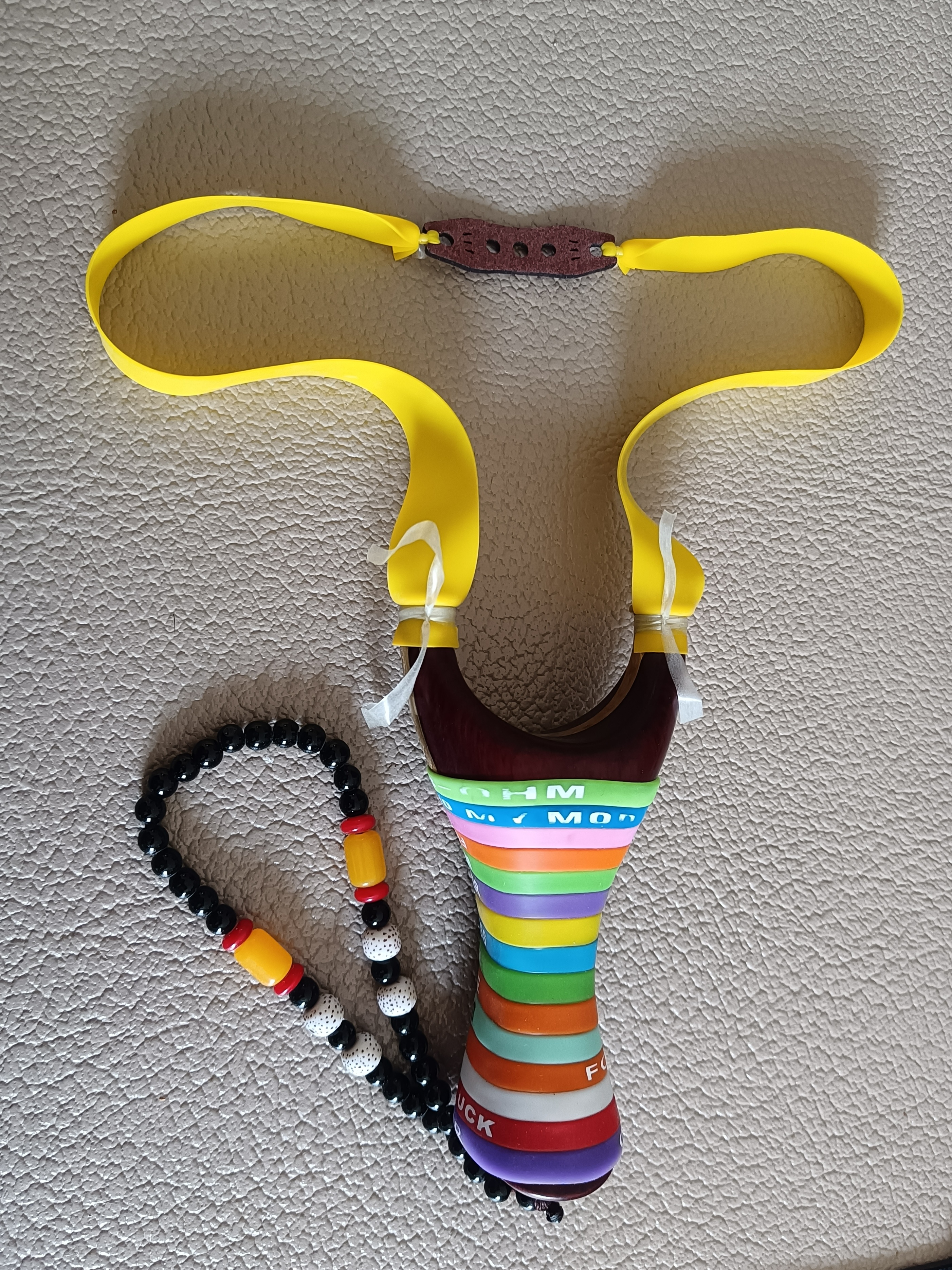 弹弓绑皮筋方头好还是圆头好,圆头快压弹弓伤皮筋怎么处理