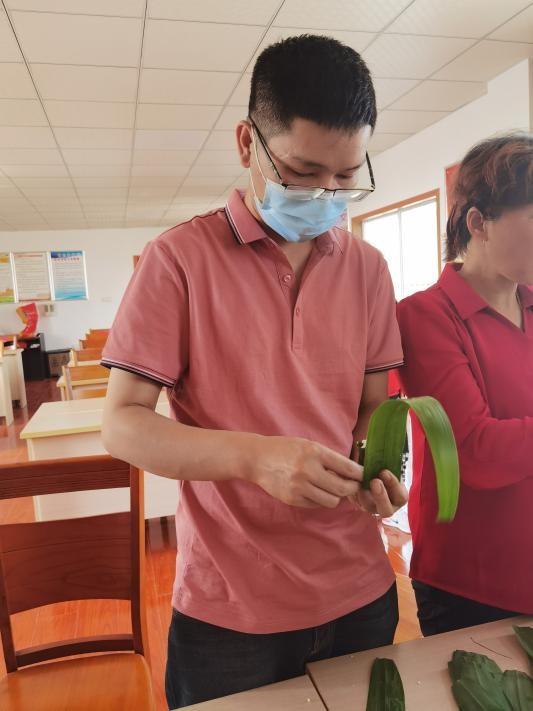 全市组织开展端午节文明实践活动,社区粽叶飘香品味端午活动主题
