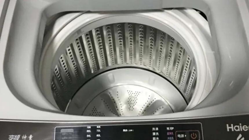 洗衣机清理出来的污垢排不出去,洗衣机里面的过滤袋怎么拿出来