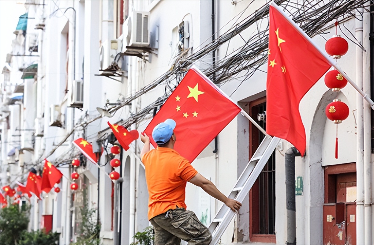 商铺门口挂国旗违法,店门前挂国旗违法吗