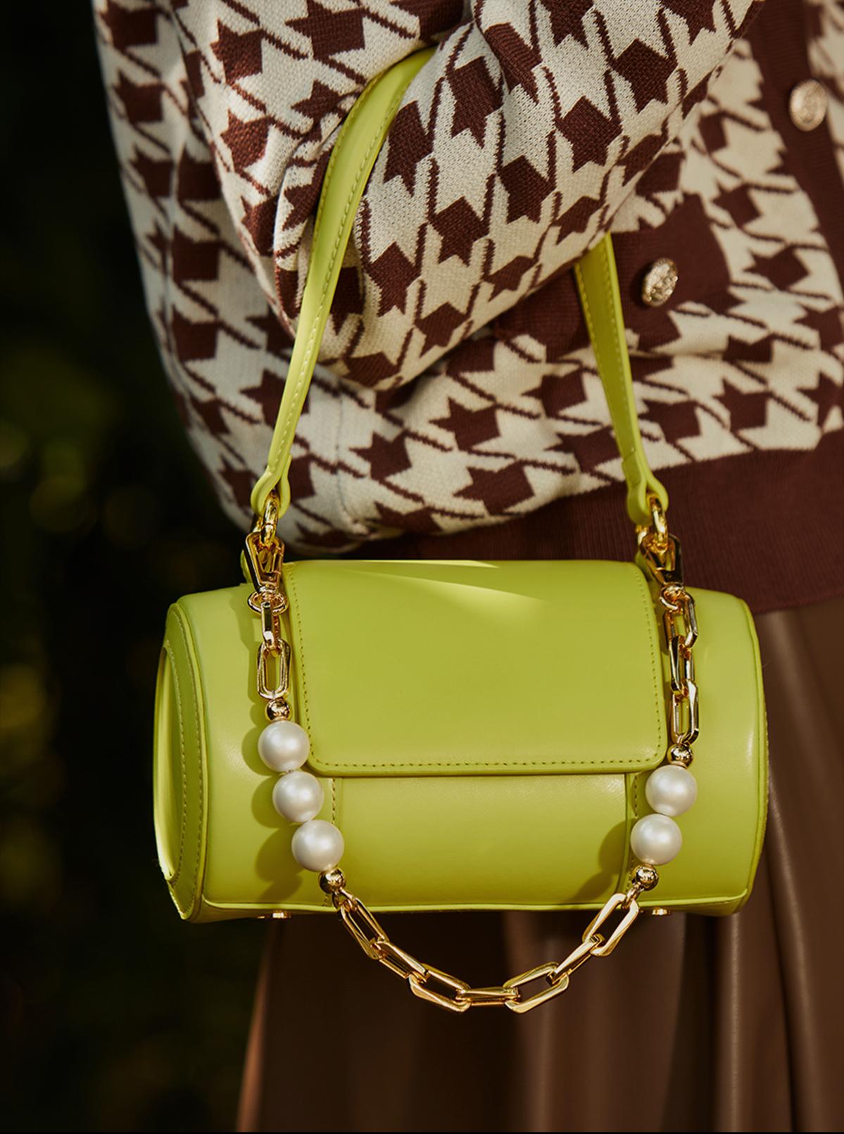 40到50岁女人适合背什么包包,40岁女性背什么牌子的包包