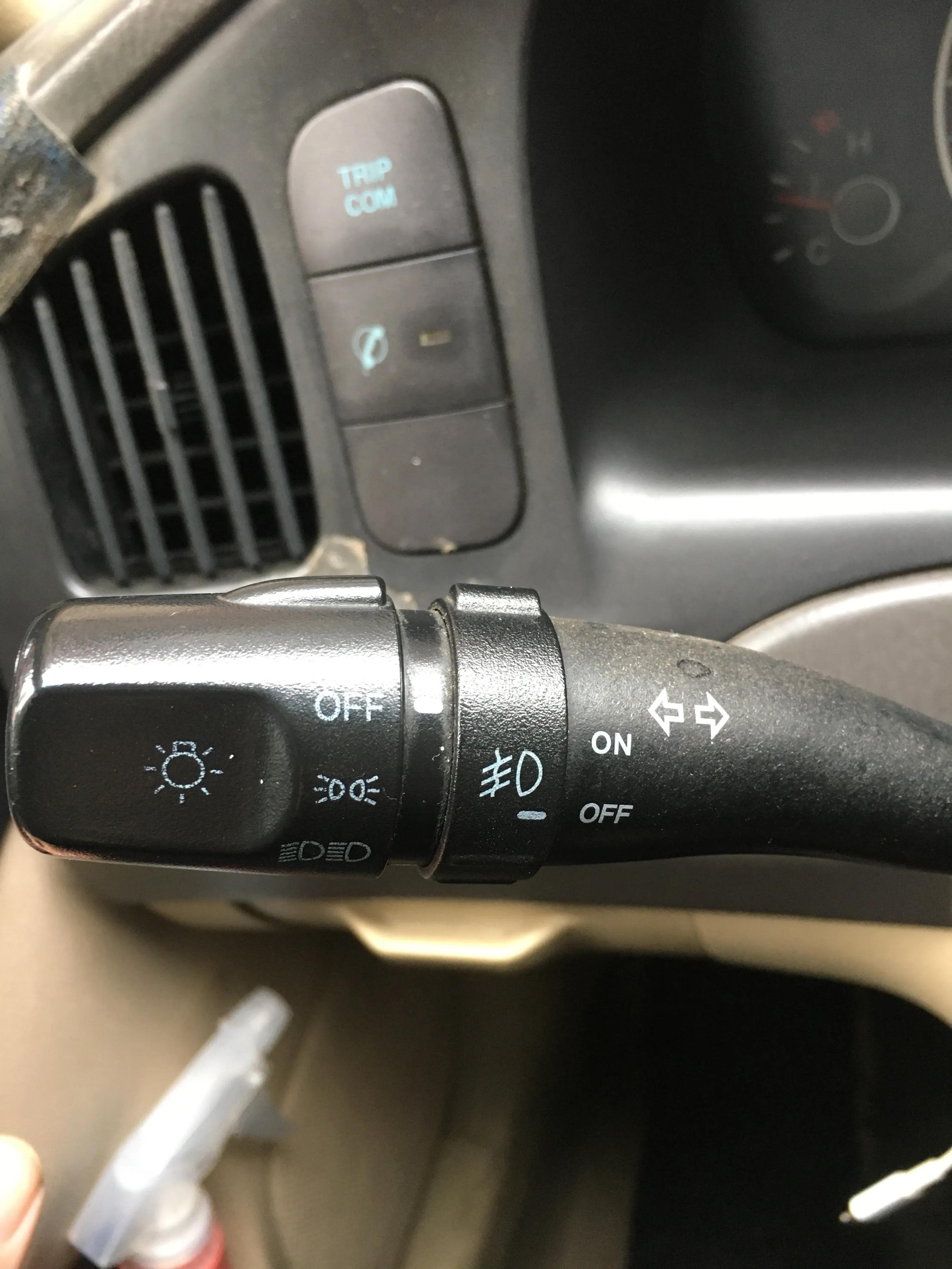 汽车灯光高低怎么调,汽车自动灯光怎么用