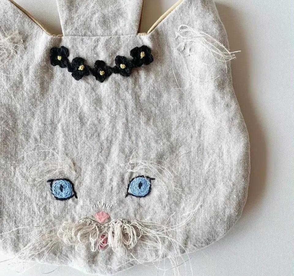 猫咪刺绣帆布包,猫咪揣手款包