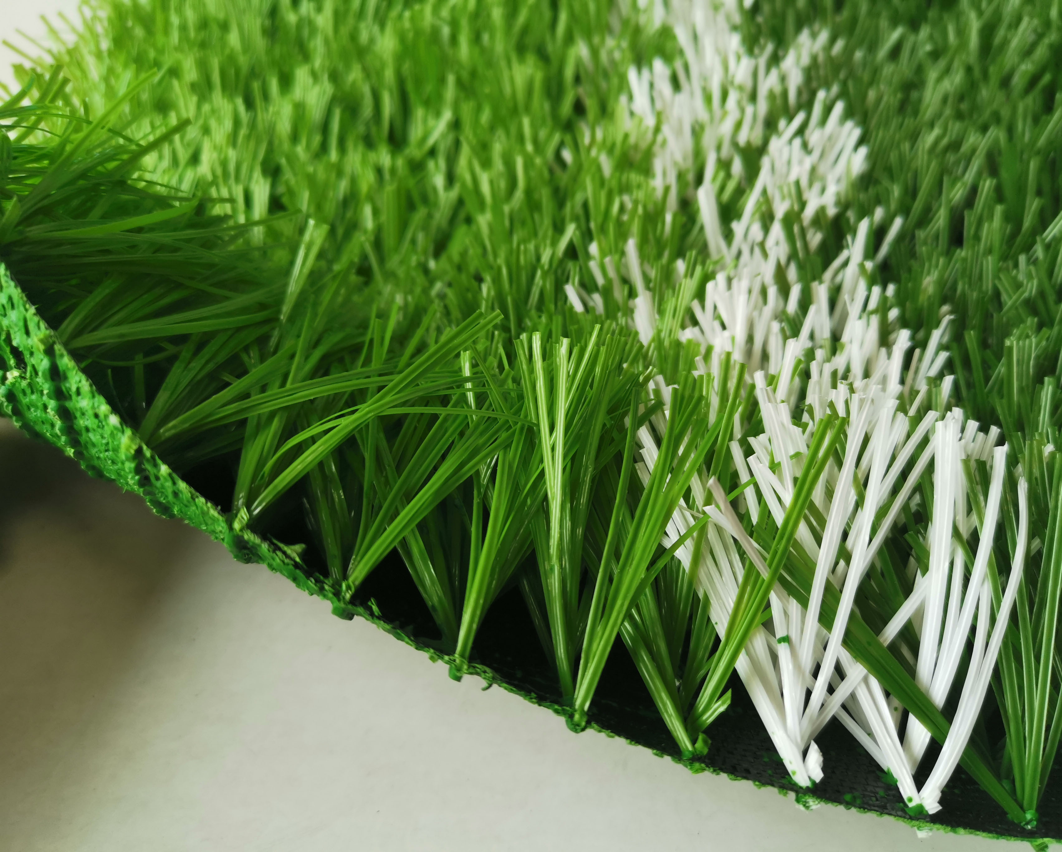 足球场假草皮铺设方法视频,足球场假草皮施工