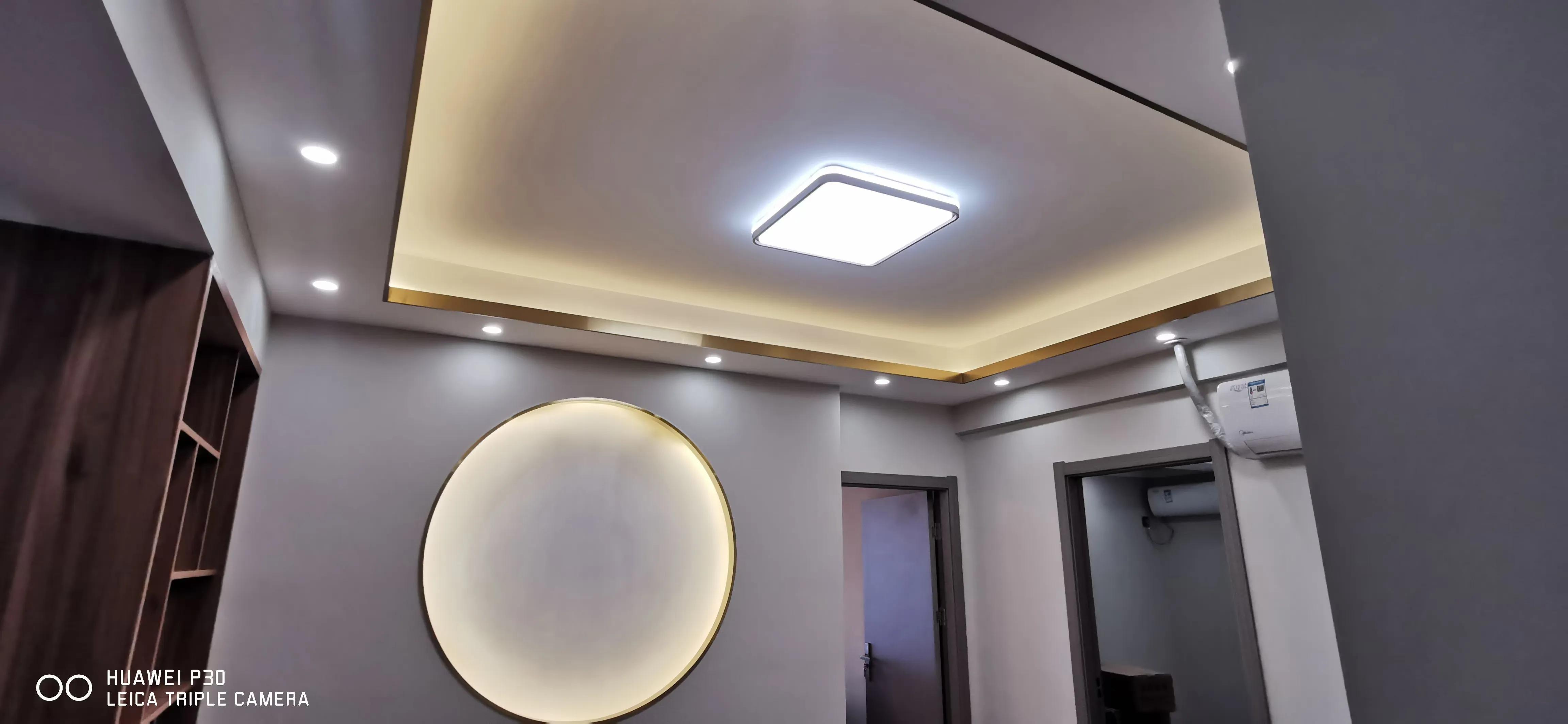 弧形背景墙弧形门套,客厅不锈钢窄边门套造型效果图